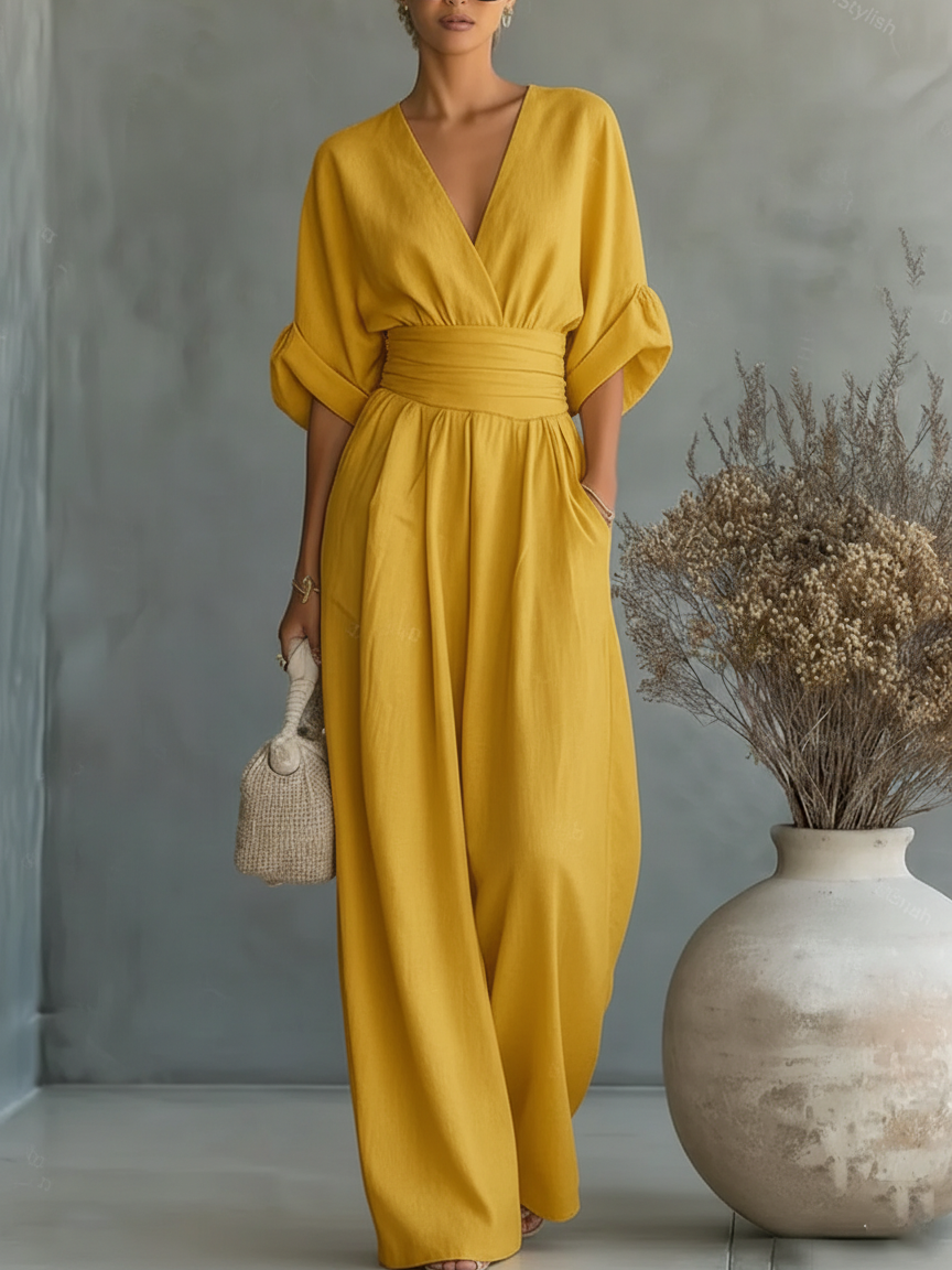 ESENCIAL - Mono elegante con cuello en V y cintura alta